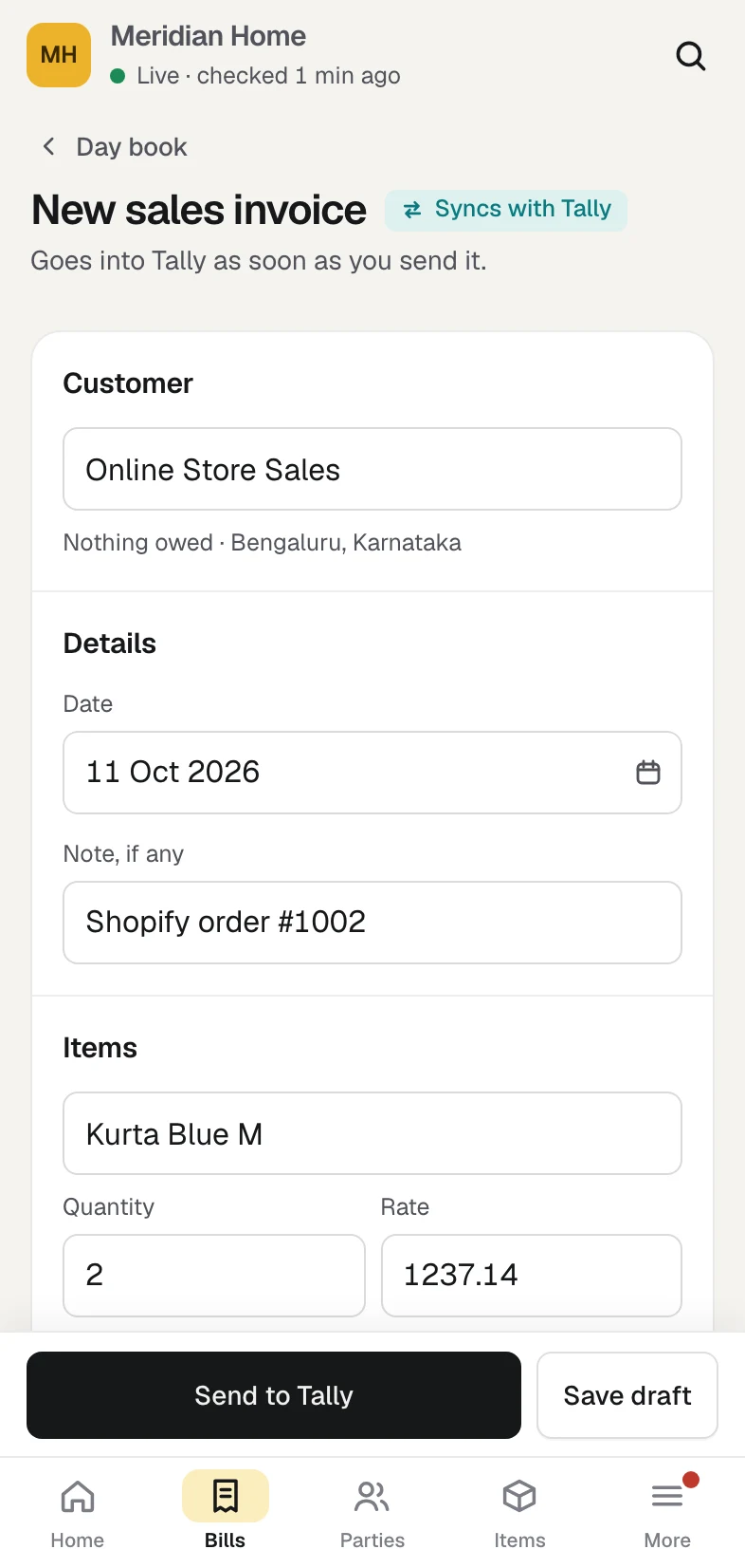 The draft from order #1002 on a phone, for the sample company Meridian Home: customer Online Store Sales, the note Shopify order #1002, two Kurta Blue M at 1,237.14, with Send to Tally and Save draft at the foot.
