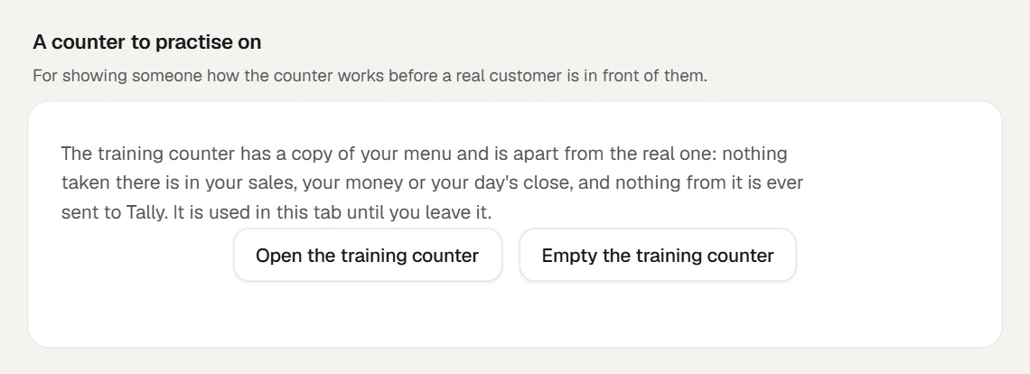 The part A counter to practise on, under Settings, Counter, for the made-up Saffron Lane Café (sample). It says the training counter has a copy of your menu and is apart from the real one: nothing taken there is in your sales, your money or your day's close, nothing from it is ever sent to Tally, and it is used in this tab until you leave it. Under it are the buttons Open the training counter and Empty the training counter.